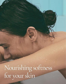 AVON Skin So Soft applying to leg to demonstrate quick absorption and non-greasy feel