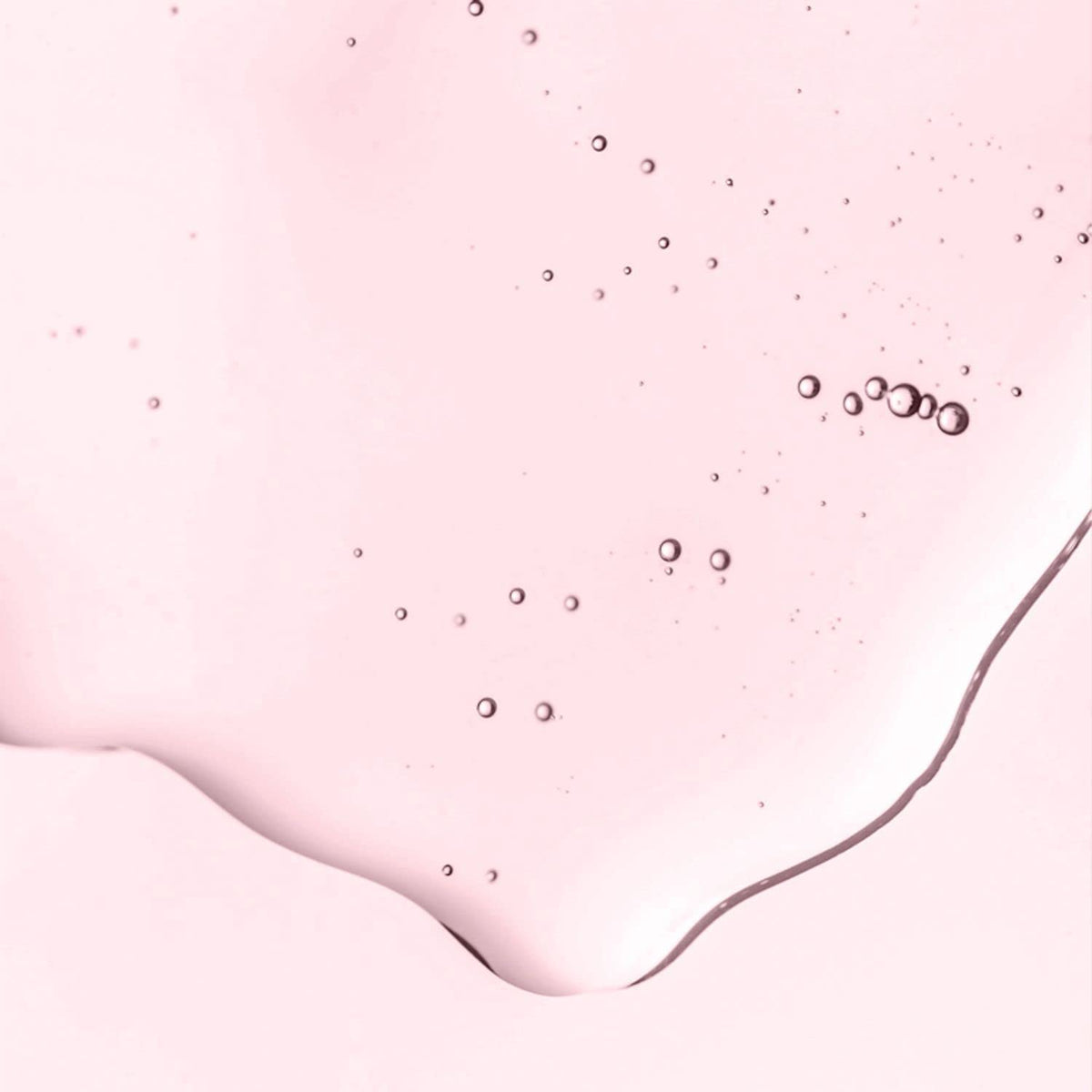 AVON oil being poured to display silky texture and fast absorption benefit
