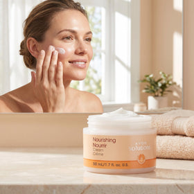 AVON cream in hand for size comparison and easy travel benefit