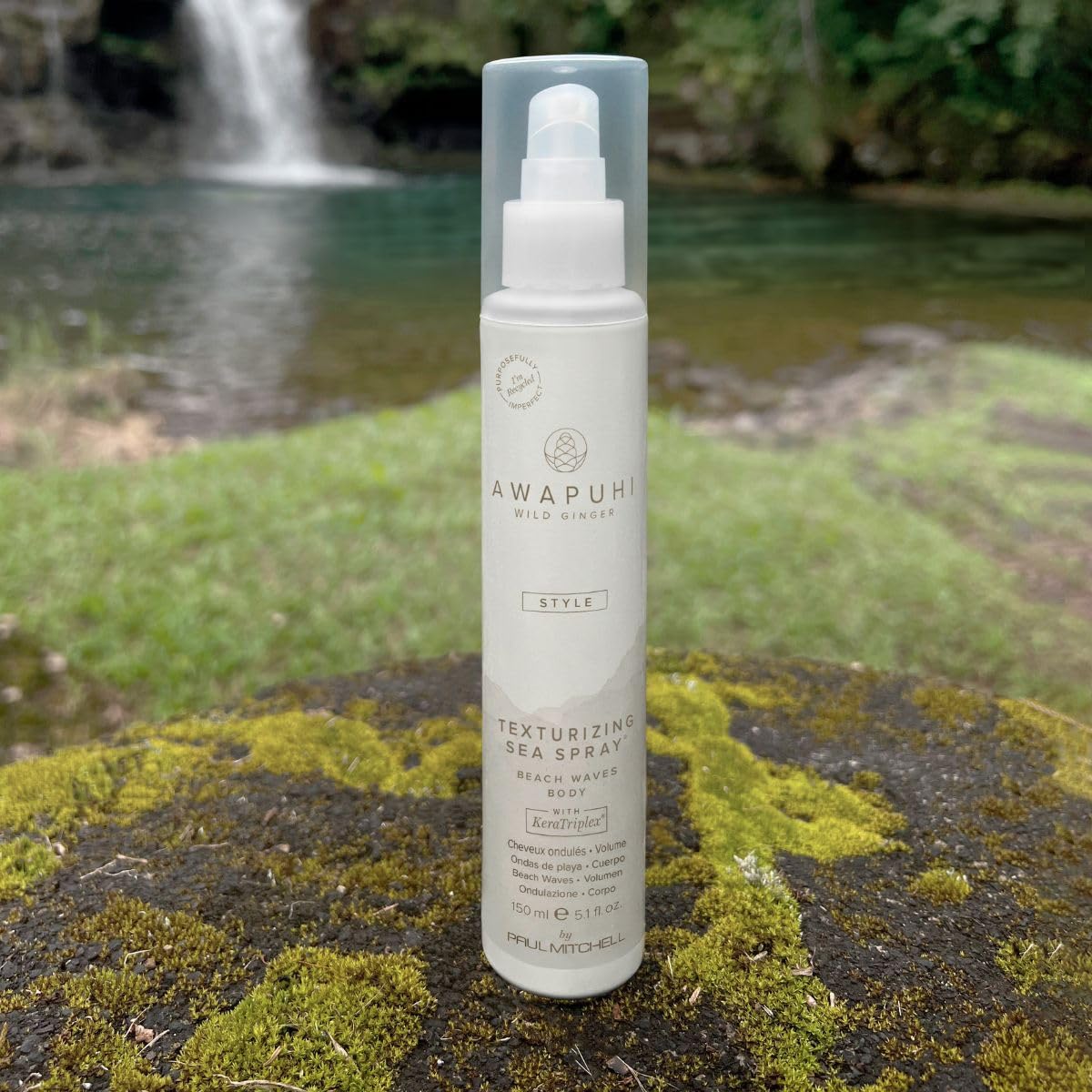 Hand holding Awapuhi Wild Ginger bottle to show true size