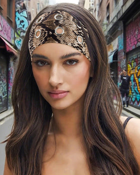 AWAYTR headband worn with ponytail demonstrates secure grip and fashion effect