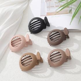 AWAYTR clips inside a travel bag ready for quick touch-ups on the go