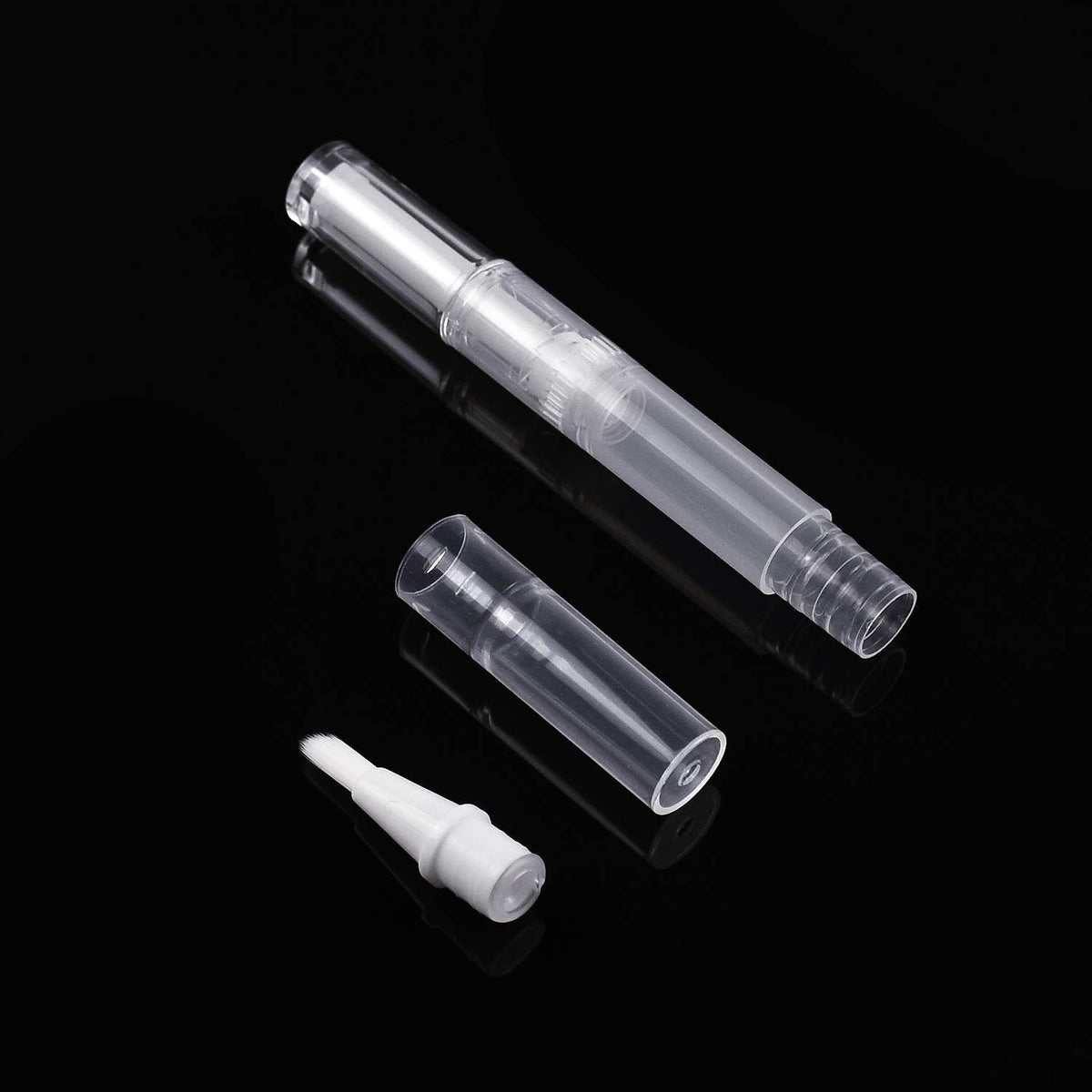 Awpeye pens next to a ruler showing 3ml capacity for compact travel storage