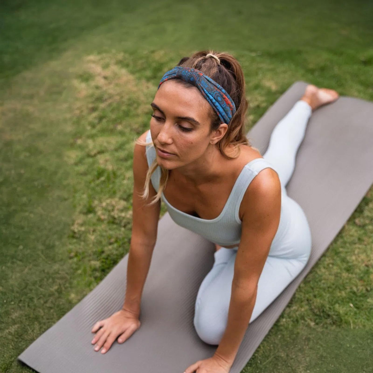 Awumbuk headband worn during yoga showing non-slip hold and comfort