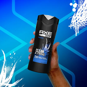 AXE Phoenix bottle in hand showing 16 fl oz scale for lasting use
