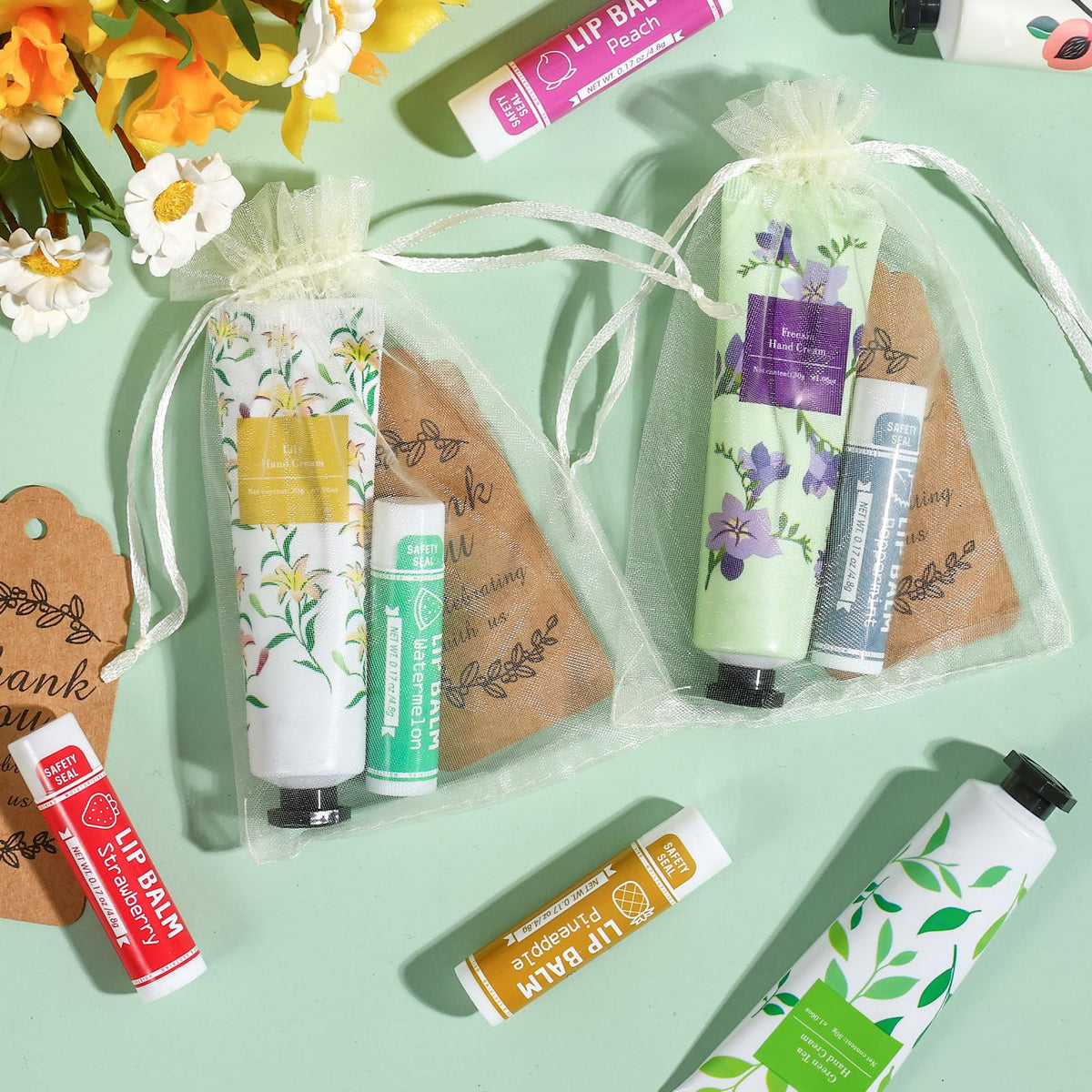 AZEN organza bag with hand cream and lip balm inside showing ready-to-give presentation