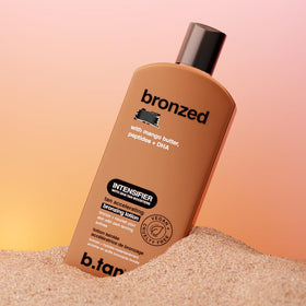b.tan being applied on forearm demonstrating even coverage and instant color