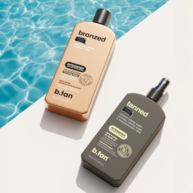 b.tan bottle by beach towel showing lifestyle bronzing and sun readiness