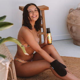 B.TAN ingredients and label close-up displaying vegan, cruelty-free formulation benefits