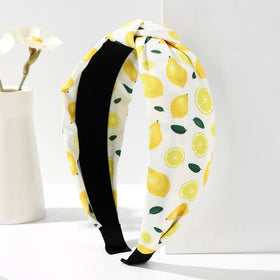 BaBakiak black fabric lemon print close-up showing vibrant contrast