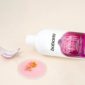 Babaria 20 oz bottle next to common items showing scale and value
