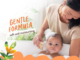 Babo Botanicals baby in bathtub using bar showing gentle, tear-free bathing experience