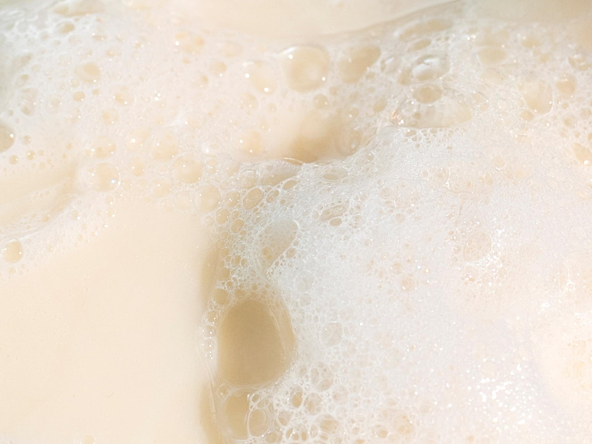 Babo Botanicals close-up of solid bar texture highlighting smooth, moisturizing surface