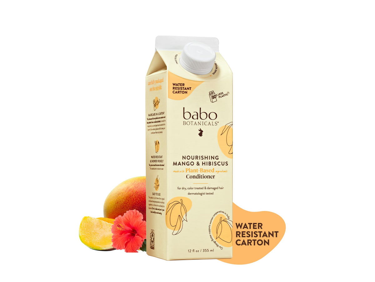 Babo Botanicals front packaging showing mango and hibiscus, highlights nourishing benefits
