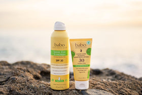 Babo Botanicals ingredient list closeup showing zinc oxide and shea butter