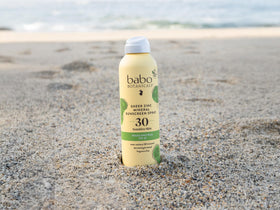 Babo Botanicals poolside scene showing water-resistant beach convenience