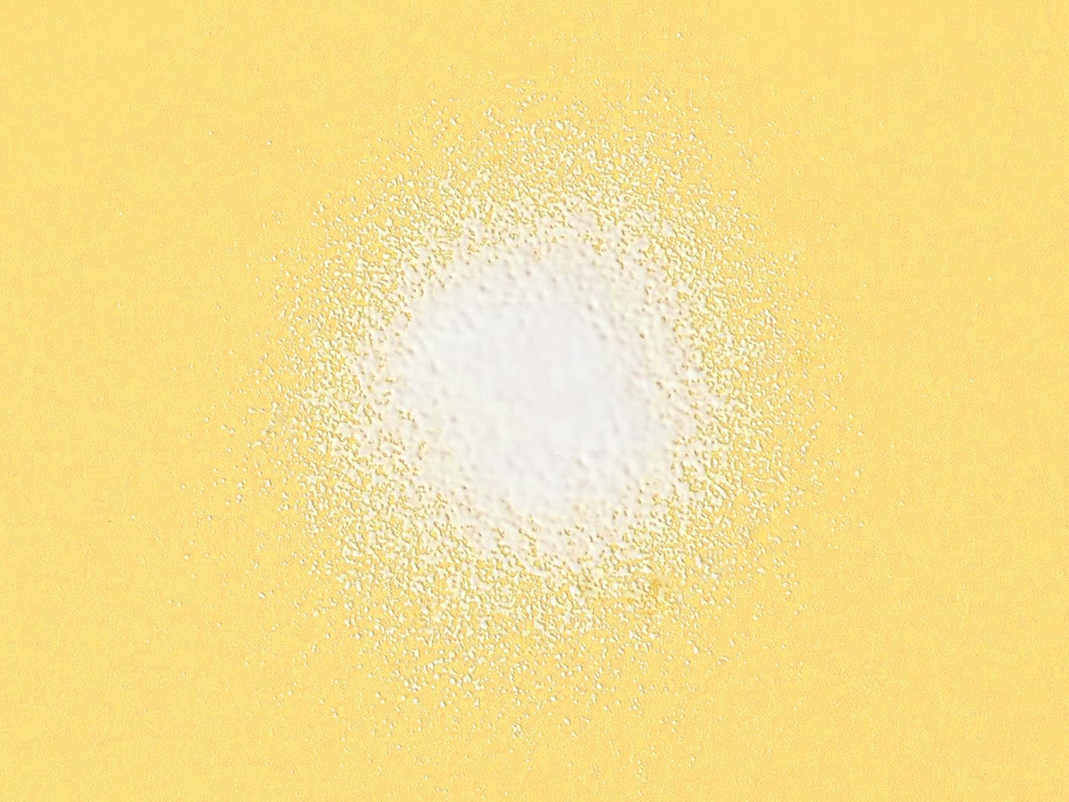 Babo Botanicals lotion texture on hand demonstrating easy rub-in and sheer finish