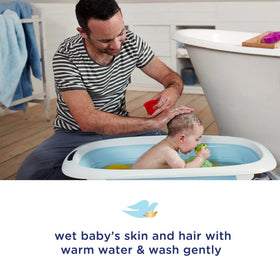 Baby Dove ingredient label detail highlighting dermatologist-tested formula