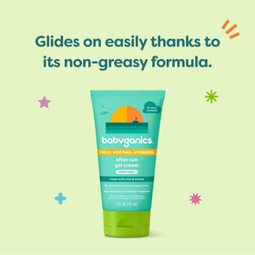 BabyGanics 5 oz tube next to sunglasses showing travel-friendly size
