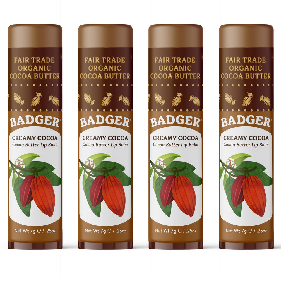 Badger front packaging of creamy cocoa butter lip balm showing large four-pack benefits