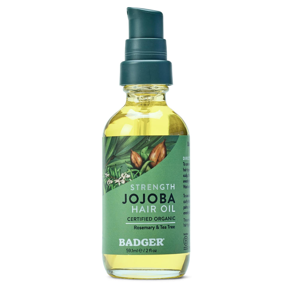 Badger glass bottle front view showing jojoba hair oil benefits