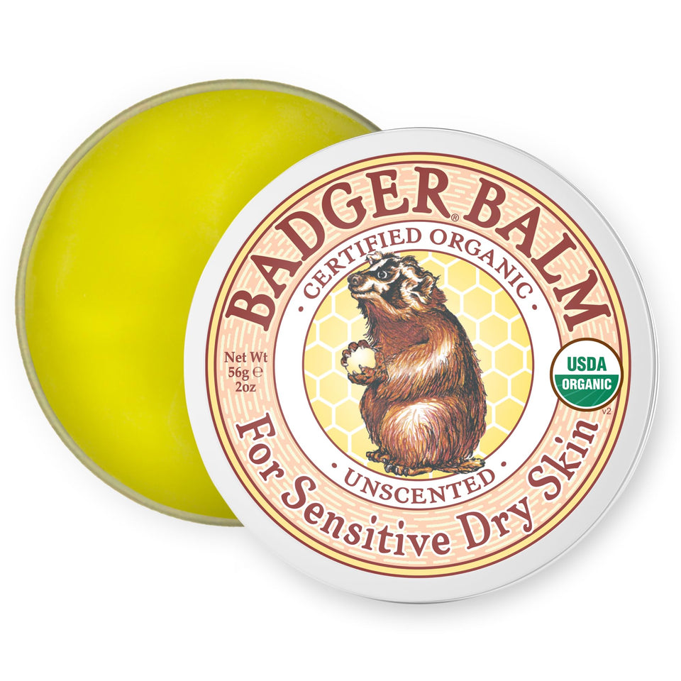 Badger tin front view showing simple organic packaging and portability