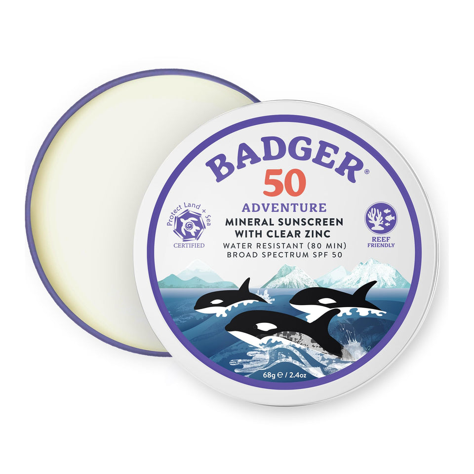 Badger tin front label showing SPF 50 and reef safe benefit