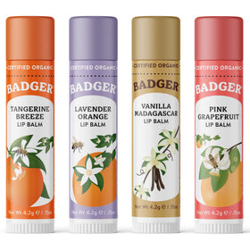 Badger yellow box front showing the four organic lip balms and brand