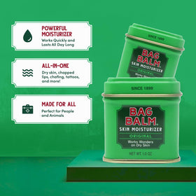 Hand applying Bag Balm from tin demonstrating soothing protection