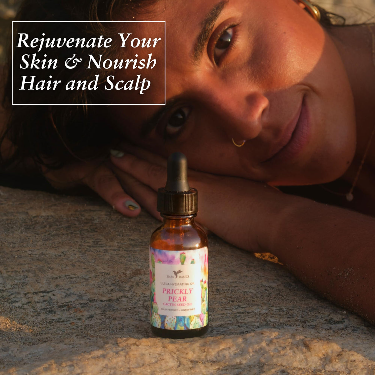 Baja Basics applying oil to face with hands demonstrating easy use and hydrated finish benefit