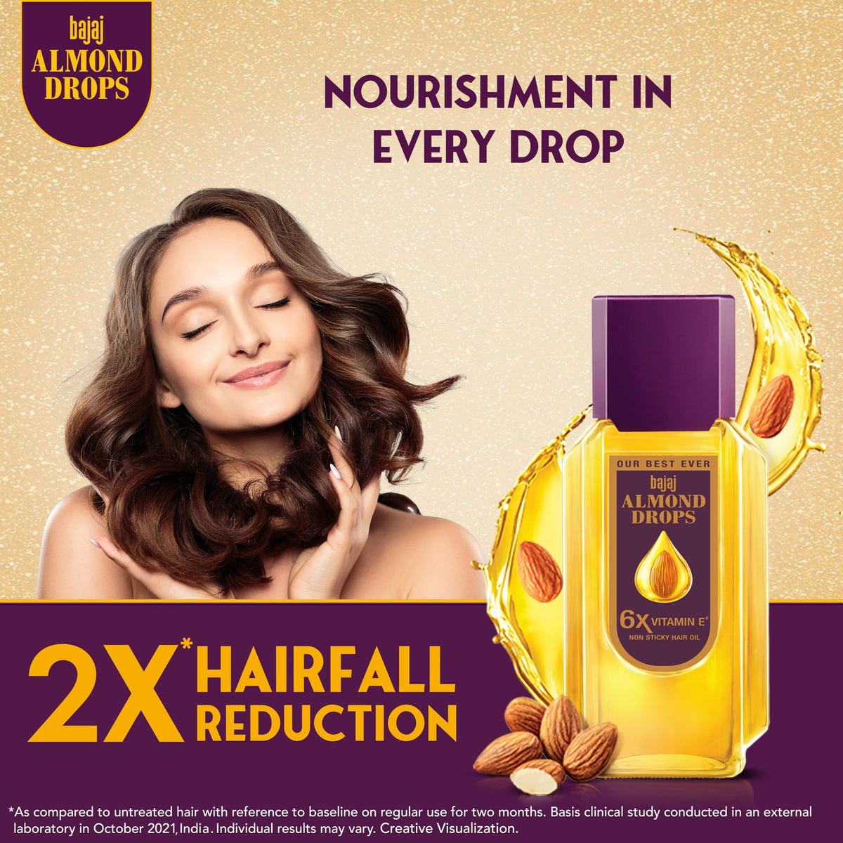 Bajaj Almond Drops close-up label emphasizing 6X Vitamin E and almond oil benefit