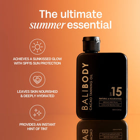 Bali Body bottle on beach towel in sunlight showing lifestyle use benefit: glowing skin aesthetic