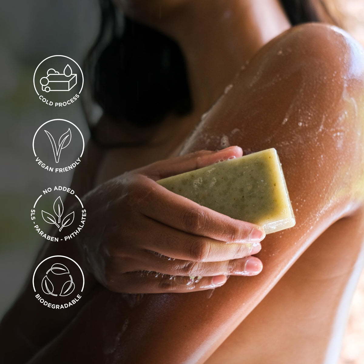 Bali Soap hand holding bar to show scale and long-lasting usage benefit