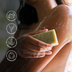 Bali Soap hand holding bar to show scale and long-lasting usage benefit