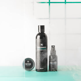 Ballsy Ballwash next to common items showing 8oz travel-friendly size