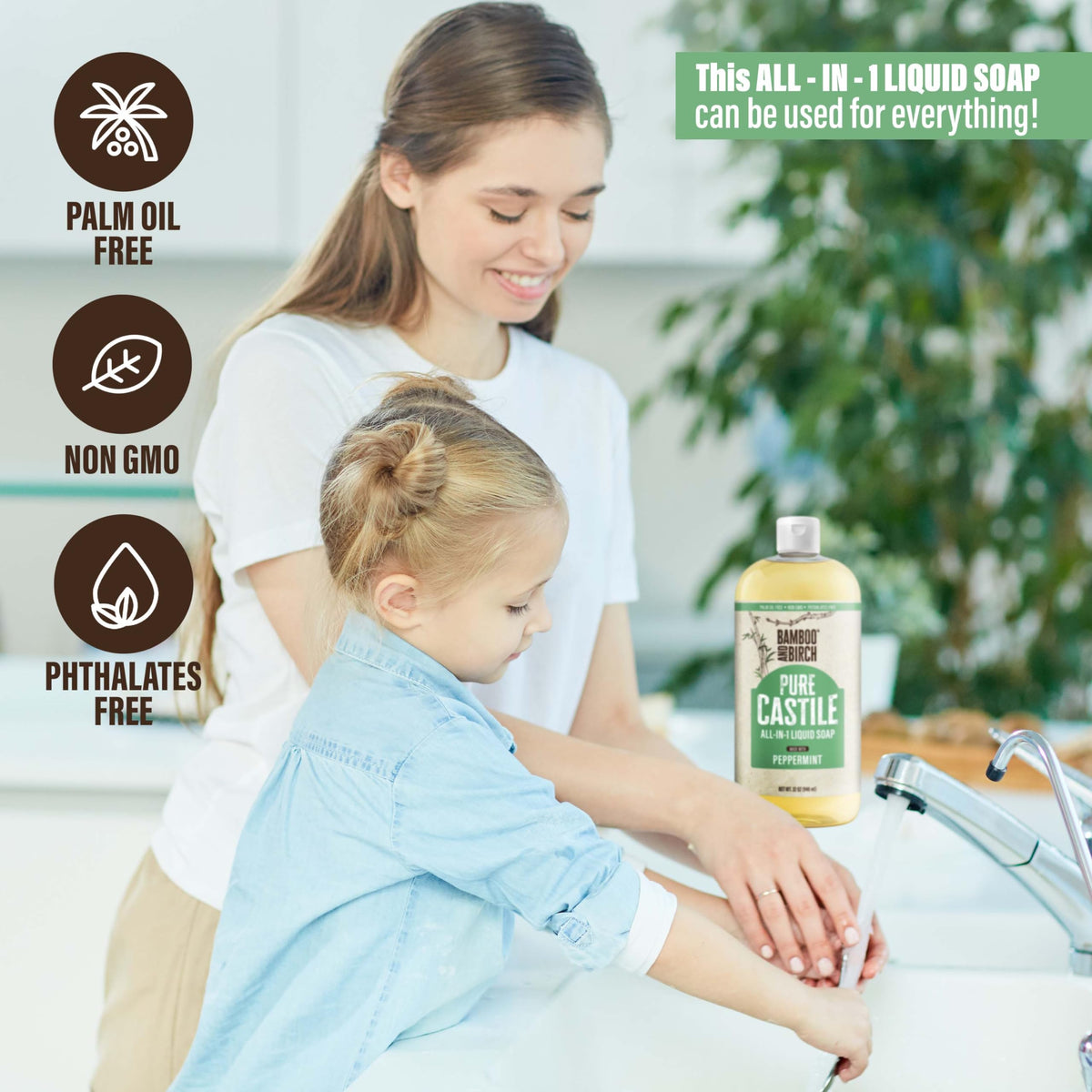 BAMBOO AND BIRCH bottle held in hand showing 32 oz scale and ergonomic design