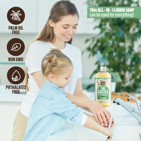 BAMBOO AND BIRCH bottle held in hand showing 32 oz scale and ergonomic design