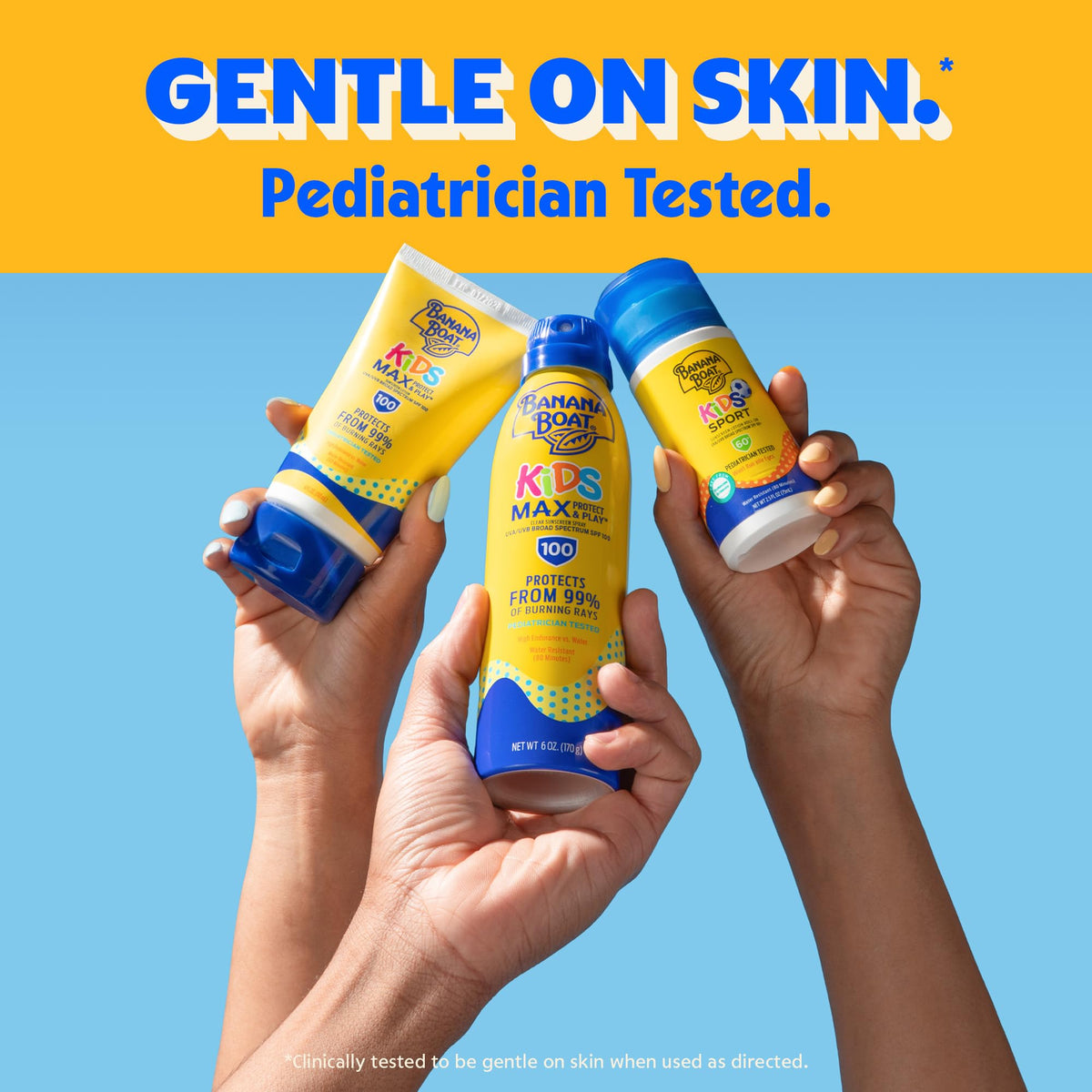 Twin 6oz Banana Boat bottles in hand to show travel-friendly size