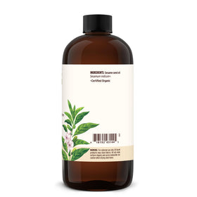 Banyan Botanicals 16 oz bottle beside common items for scale and volume