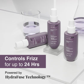 Bare Anatomy leave-in conditioner being dispensed into hand for effortless application