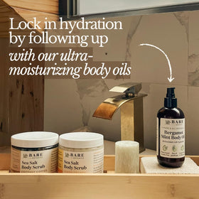 Bare Botanics open jar displaying salt and oil blend for effective exfoliation