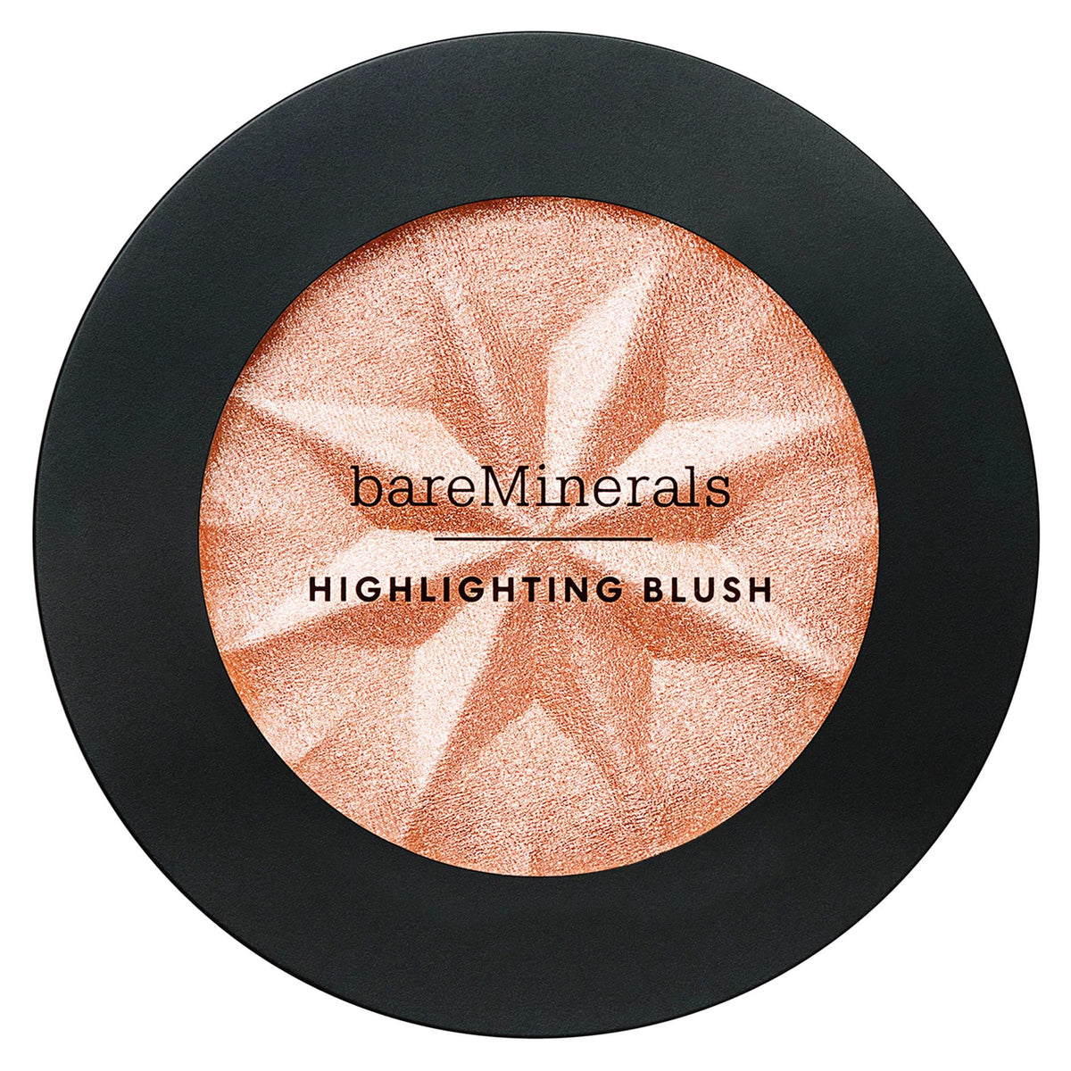 bareMinerals swatch on arm showing Peach Glow warmth and buildable coverage benefit