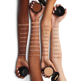bareMinerals compact beside a coin showing size and travel-friendly benefit
