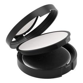 bareMinerals brush applying powder for an even, long-lasting makeup set