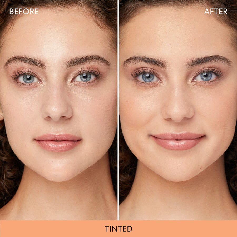 bareMinerals brush applying powder to T-zone to reduce shine and blur pores