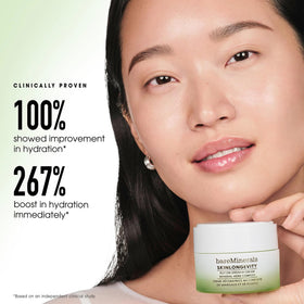 bareMinerals open jar with cream swipe demonstrating creamy application