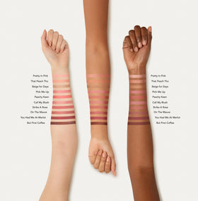 bareMinerals brush applying blush showing soft application and seamless blending