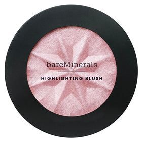bareMinerals swatch on forearm demonstrating rosy glow and buildable color