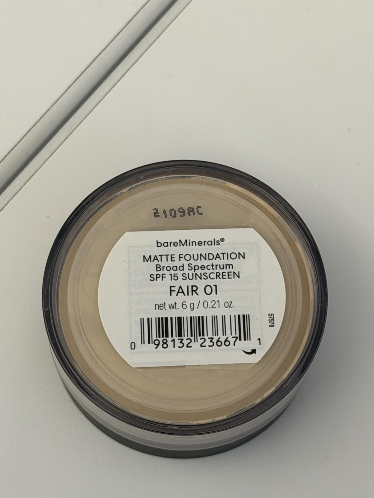 bareMinerals in a makeup bag suggesting portability and daily use benefit