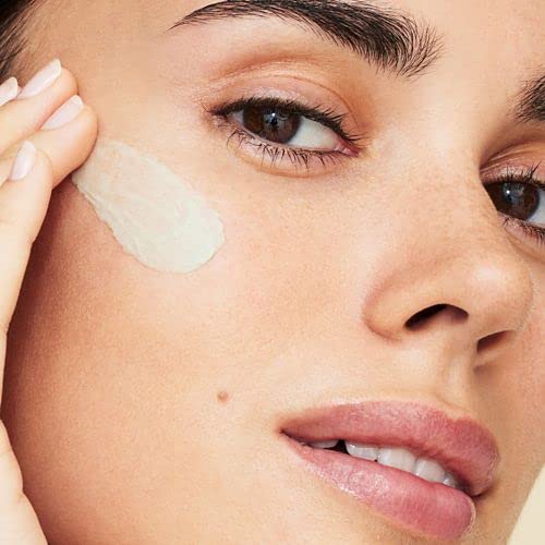 bareMinerals swatch on hand showing seamless blend and redness reduction
